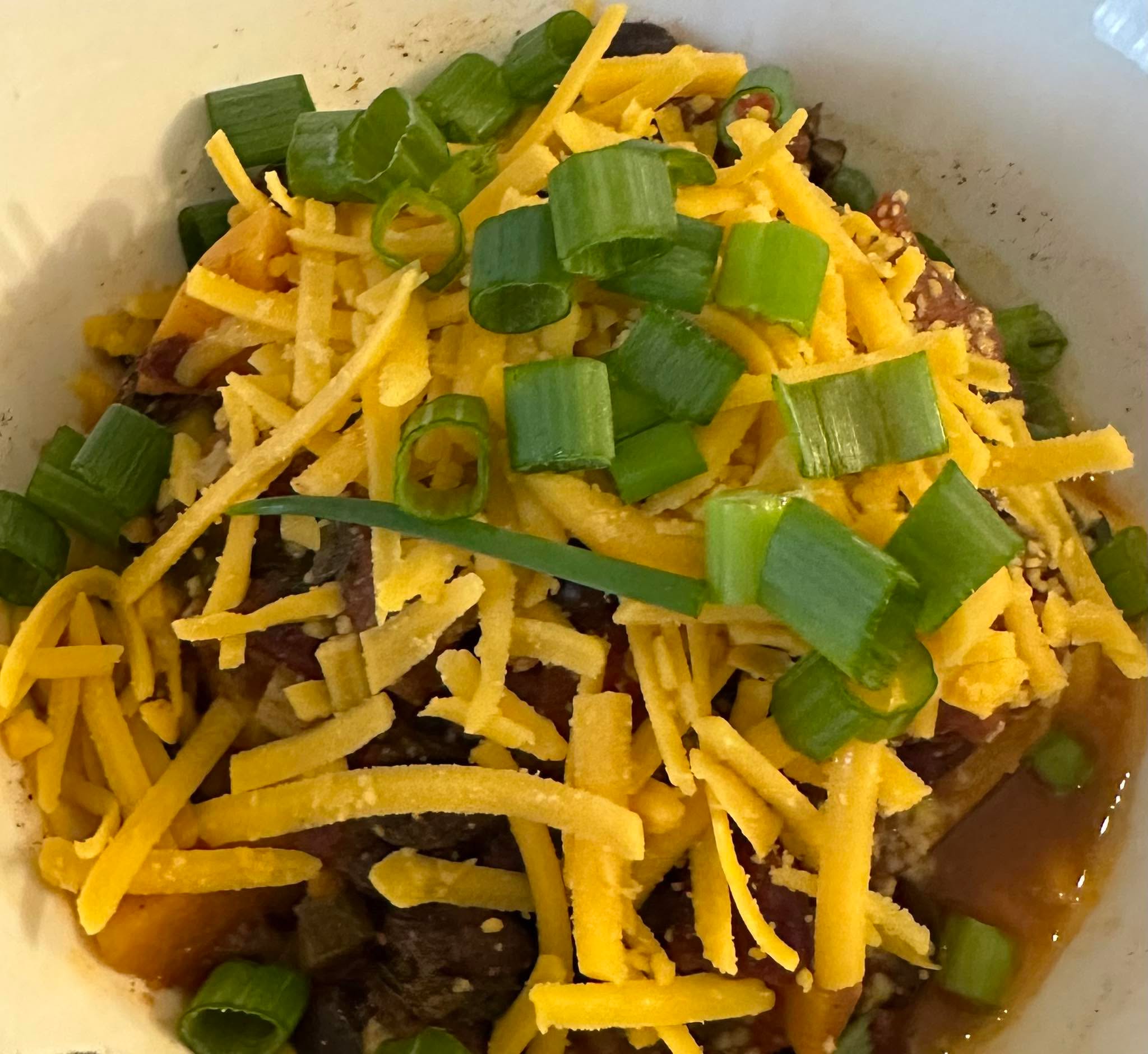 Every meal should make you smile!

Remember my rutabaga rounds from my discount purchase? One of these is at the bottom here, beautifully seasoned with sage and Thyme when roasted. 

Topped with a portion of veggie filled chili, vegan “cheese” and green onions. 

Yummy, satisfying and nutritious!

How was your lunch?